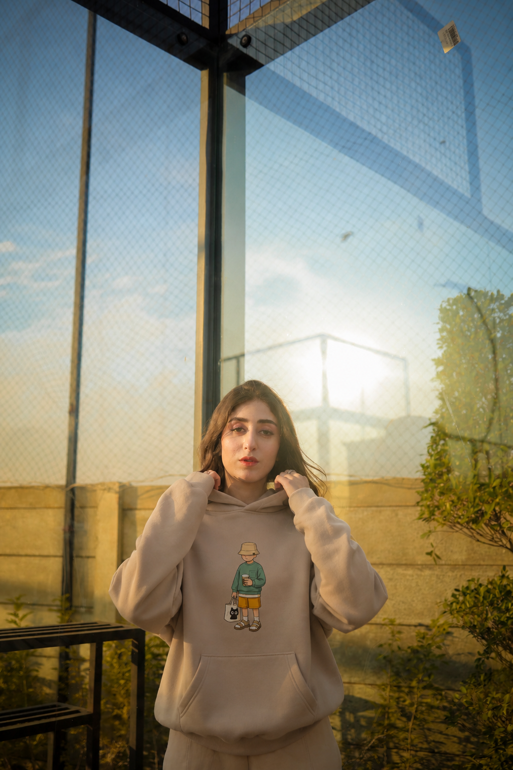 Beige oversized ELUX graphic hoodie back view with minimal streetwear design and relaxed fit